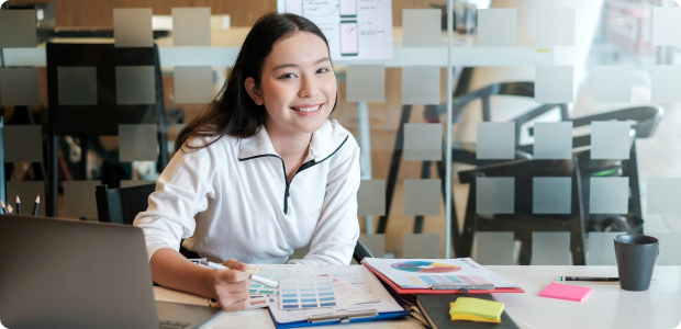 Student smiling at the camera